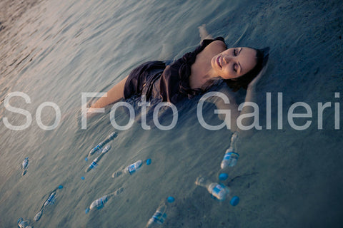 Swimming with bottles (Athens, Greece)